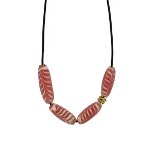 An Indonesian Pink   White Swirl Glass Bead Necklace