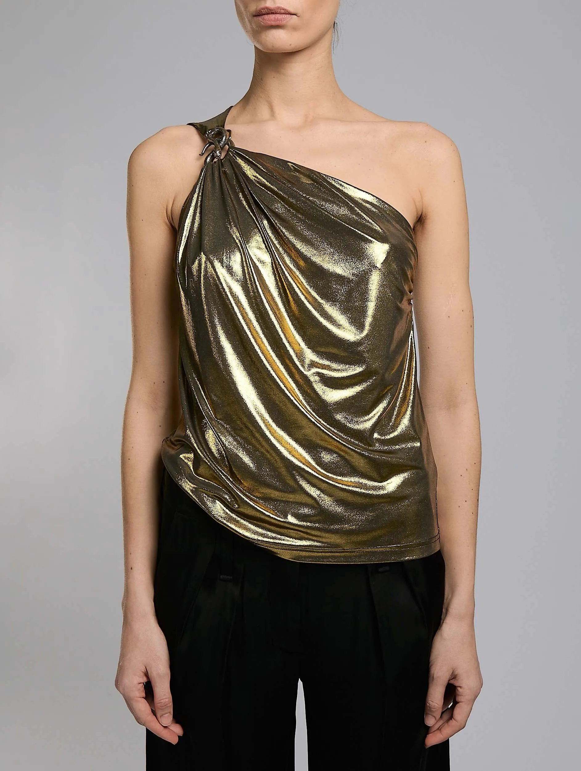 Asymmetrical top in gold metallic jersey
