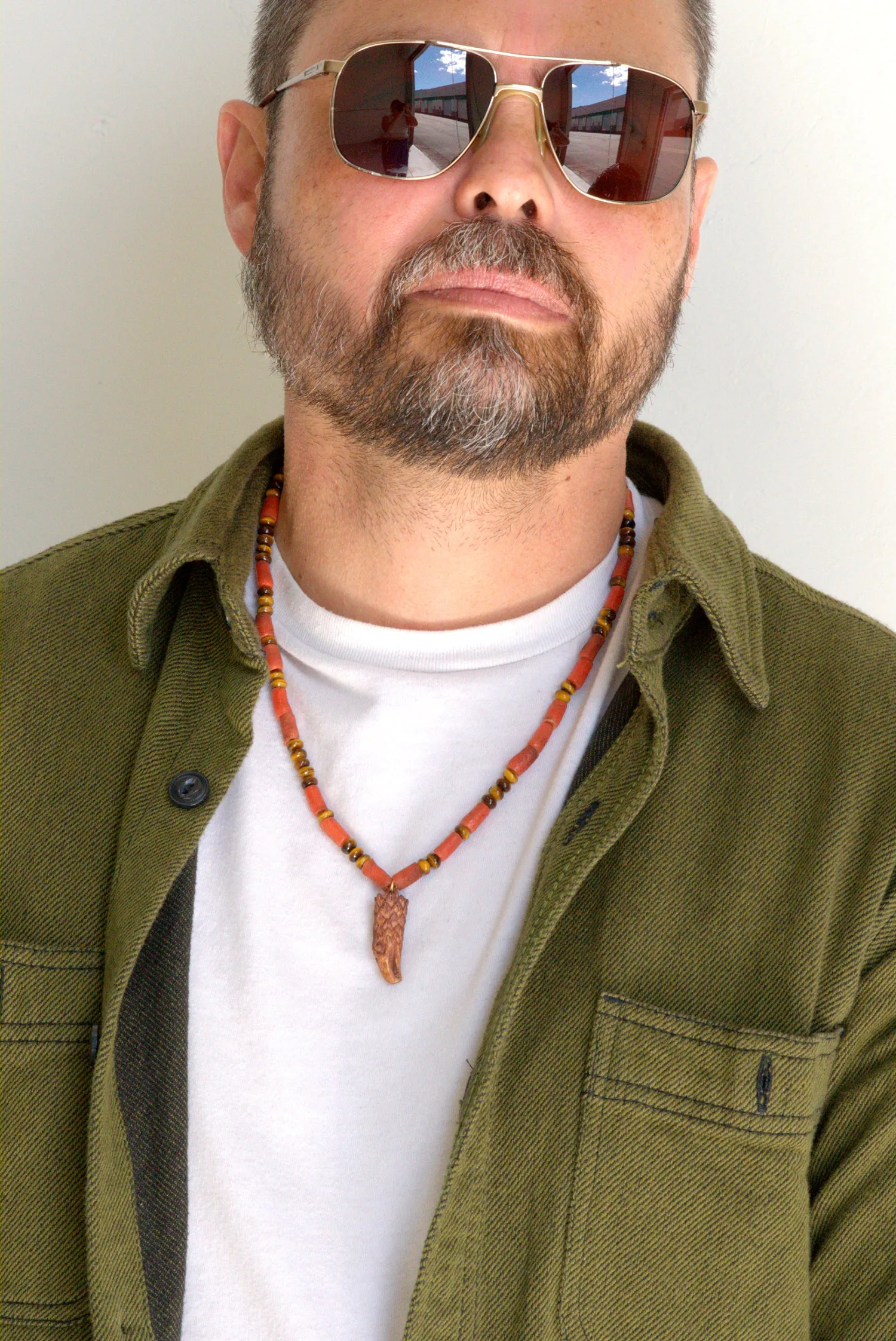 Carved eagle head necklace