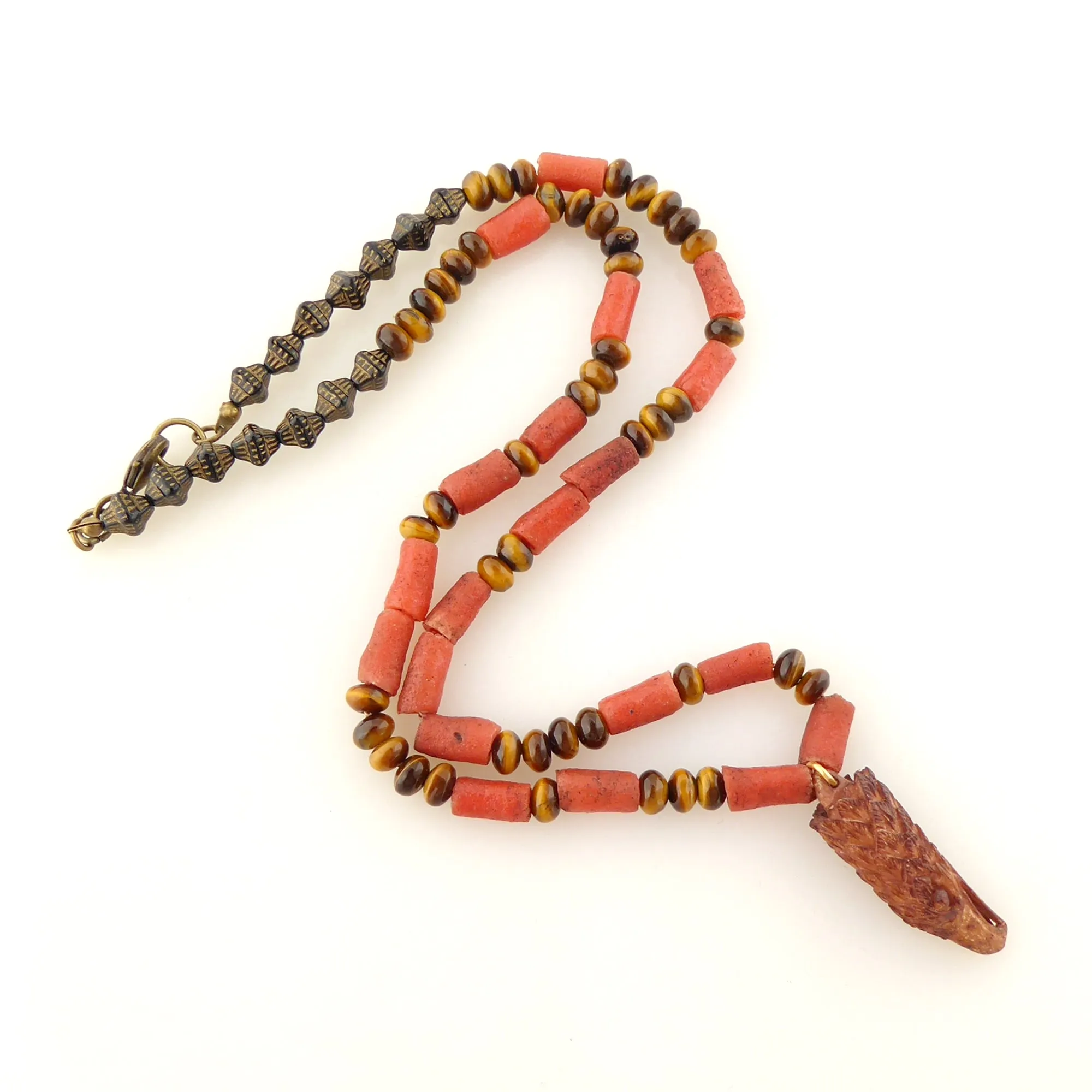 Carved eagle head necklace