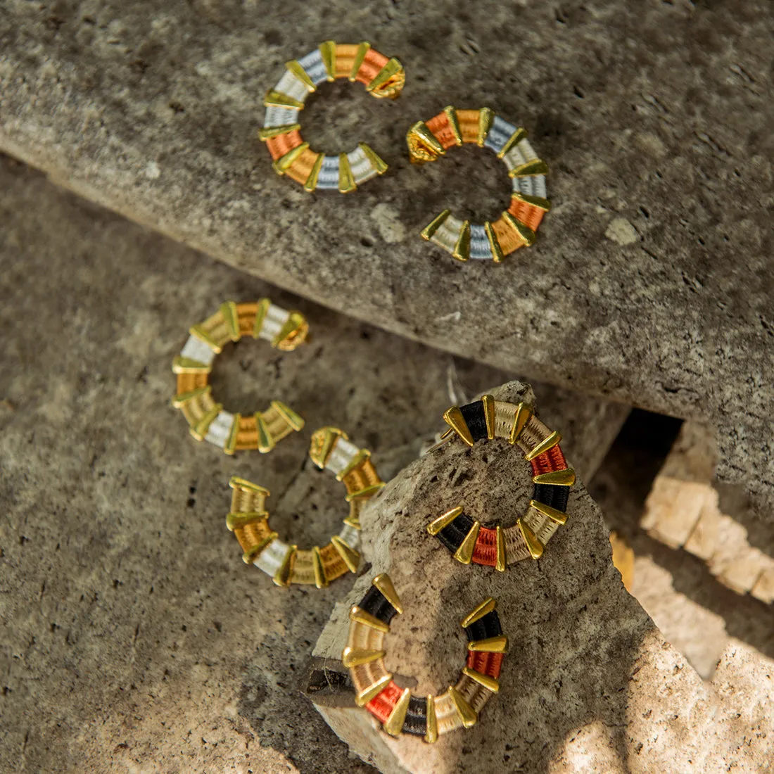 Hoop gold plated earrings in woven design