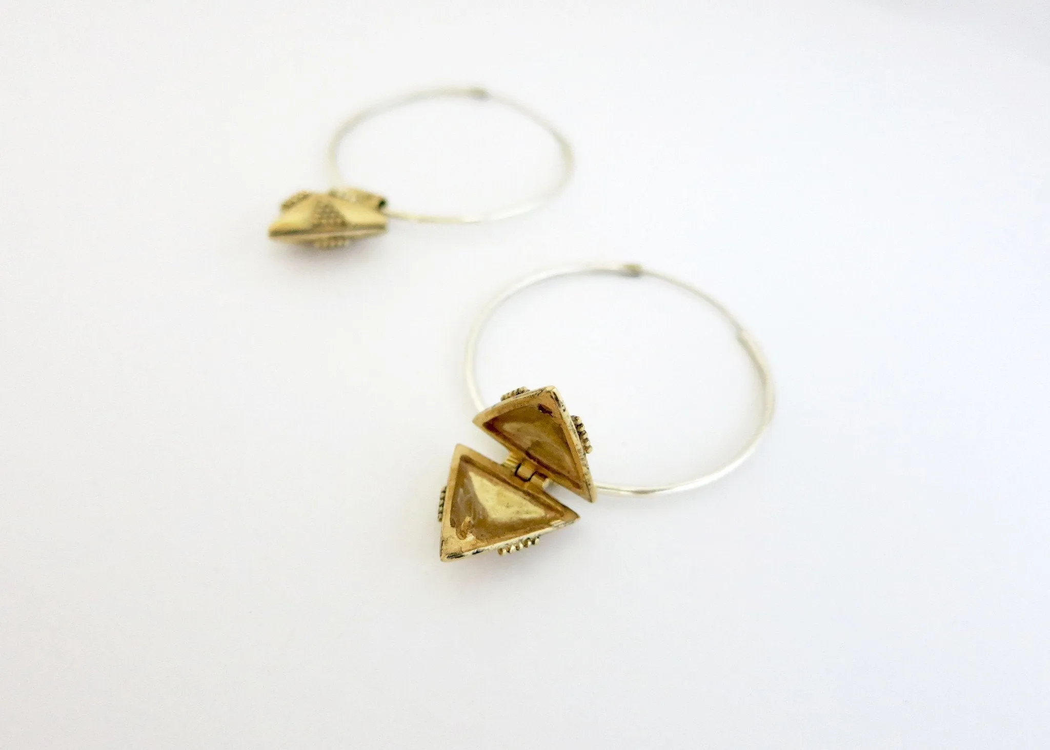 Hoops with unique, detachable, gold-plated lockets