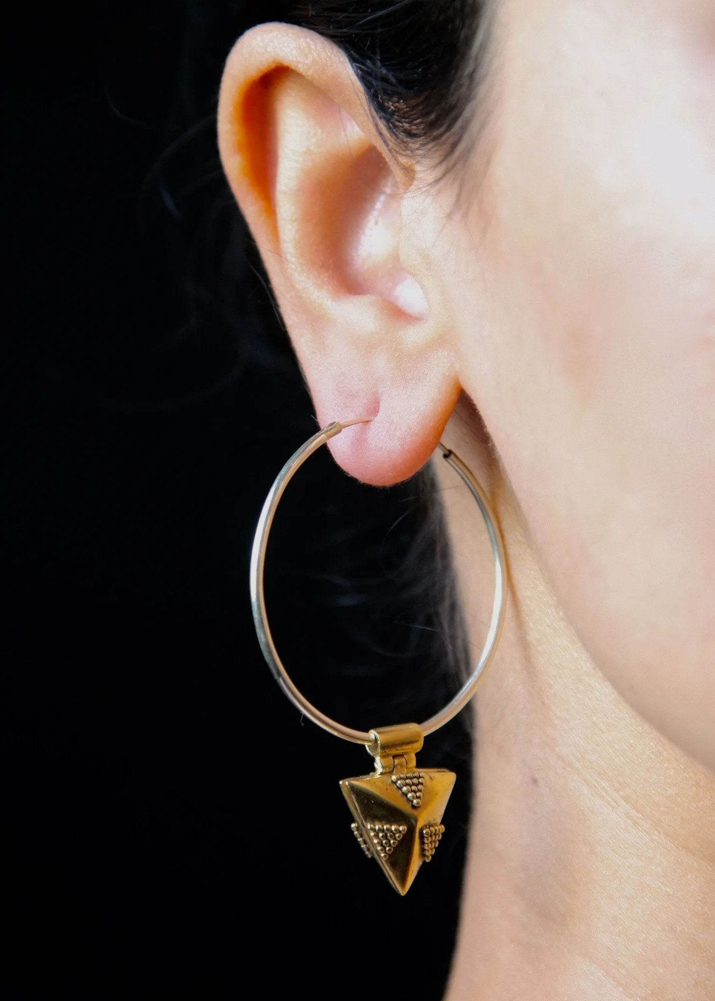 Hoops with unique, detachable, gold-plated lockets